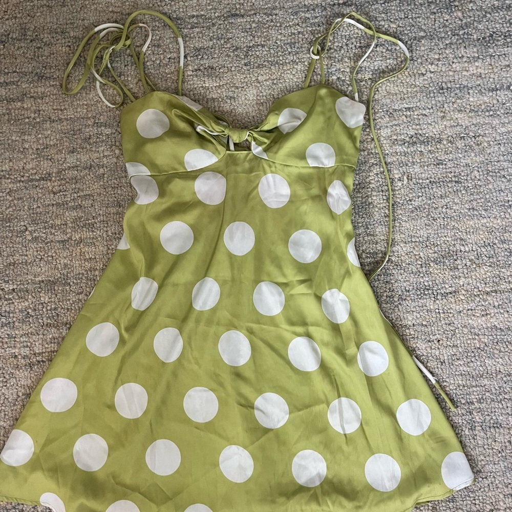 Green and white polka dot dress